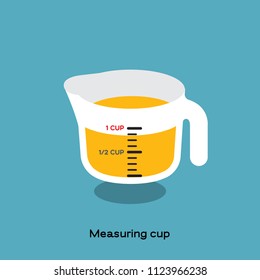 Glass measuring cup, a kitchen utensil, with yellow fluid on blue background. There is scale marked on.
