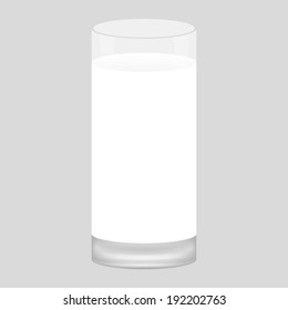 glass of milk on a gray background