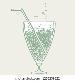 glass glass on the leg with a carbonated drink and a cocktail. the bubbles fly out of the glass
