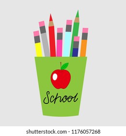 a glass with pencils