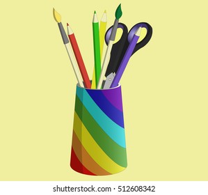 glass with pencils