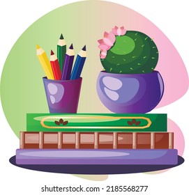 A glass of pencils and a cactus in a flower pot on a stack of books