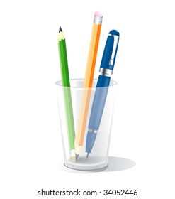 Glass With Pencils And Pen