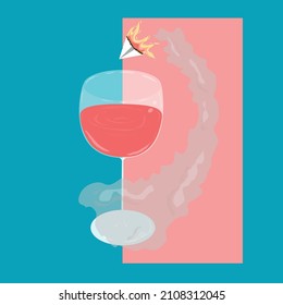 A glass of red wine and a burning paper plane