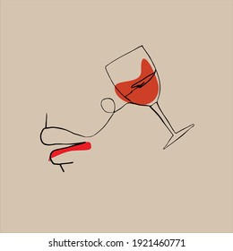 Un vaso de vino tinto y gotas en los labios.
