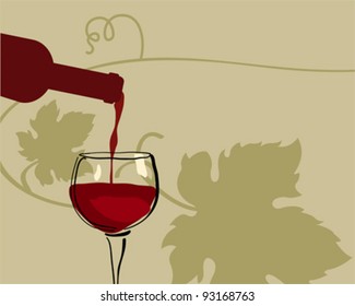 Glass of red wine with grape