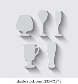 Glass set or collection with shadow on a grey background