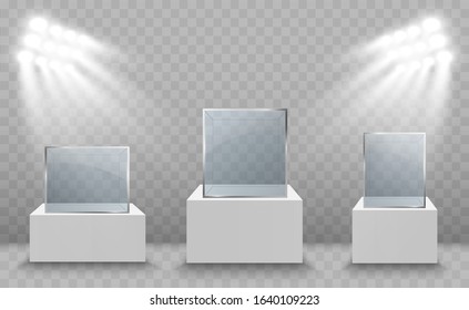 Glass showcase for the exhibition in the form of a cube. Background for sale illuminated by spotlights. Museum glass box isolated advertising or business design boutique. Exhibition hall.