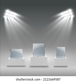 Glass showcase for the exhibition in the form of a cube. Background for sale illuminated by spotlights. Museum glass box isolated advertising or business design boutique. Exhibition hall.