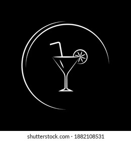 Glass with a slice of lemon and a straw.