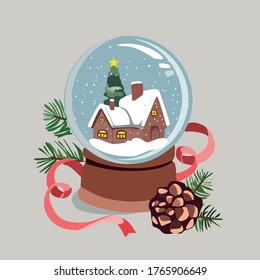 Un globo de nieve de vidrio con caída de nieve, una pequeña casa y un árbol de Navidad bajo la nieve. Esfera de vidrio mágico sobre un fondo claro. Un globo de nieve con un cono, cinta rosa y ramas de un árbol de Navidad