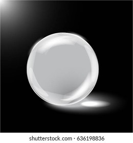 Glass sphere on black background
