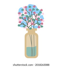 glass transparent tall vase with a bouquet of small gilded and pink flowers
