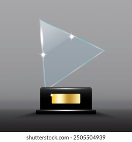 Glass trophy award. Transparent triangular shape with shining highlights. Black base with gold plate.