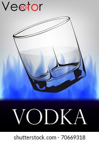 glass with vodka on fire background