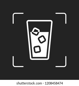 glass of water with ice cubes icon. White object in camera autofocus on dark background