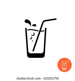 Glass of water or juice black icon. Glass with straw and sparkling bubbles.