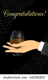 a glass of whiskey in hand