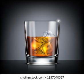 Glass of whiskey with ice on black background