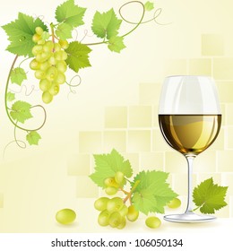  Glass of white wine and grapes