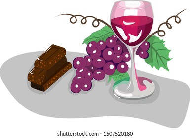 glass of wine bunch of grapes and chocolate