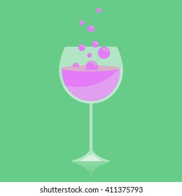 Glass of wine and flying bubbles