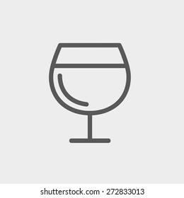 Glass of wine icon thin line for web and mobile, modern minimalistic flat design. Vector dark grey icon on light grey background.