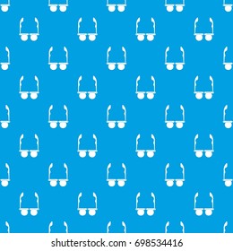 Glasses with black round lenses pattern repeat seamless in blue color for any design. Vector geometric illustration