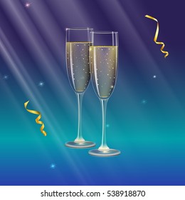 Glasses of champagne and streamer with rays of light on background. Champagne with bubbles in a wineglass with place for your text