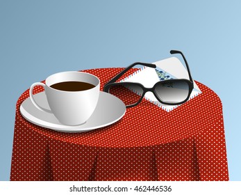 Glasses, cup and card on tablecloths