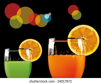 Glasses with green and orange drink