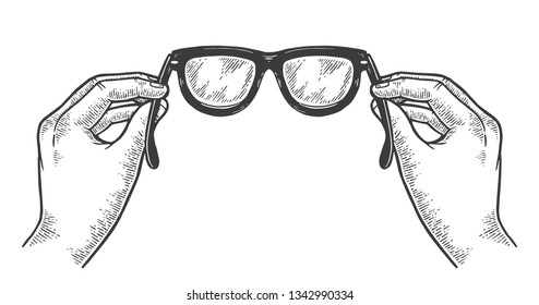 Glasses in hands sketch vintage engraving vector illustration. Scratch board style imitation. Black and white hand drawn image.