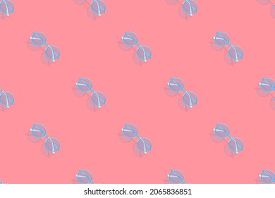Glasses seamless pattern. Background with a set of round glasses.