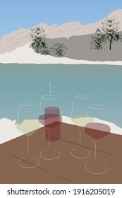 glasses and wine on the table at the seaside