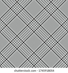 Glen pattern in grey and black. Seamless diagonal hounds tooth check plaid in black and grey for jacket, coat, skirt, trousers, or other autumn winter textile print.