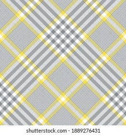 Glen plaid pattern texture in grey, yellow, white. Tweed checked plaid background for jacket, coat, skirt, blanket, duvet cover, or other modern spring summer textile design.