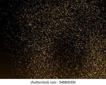 Glitter dust. Vector gold glitter texture on a black background.
