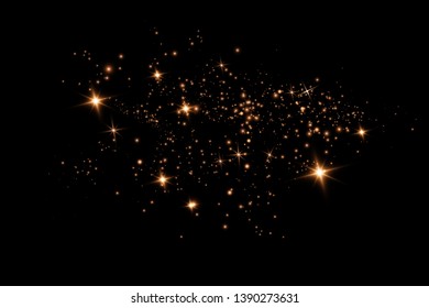  Glitter effect of particles.  Vector sparkles on a transparent background. Christmas light effect. Sparkling magical dust particles.The dust sparks and golden stars shine with special light.
