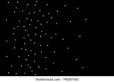 Glitter gold particles on black background. Vector star dust effect isolated on dark backdrop. 2018 christmas card with glowing falling tiny confetti. Luxury invitation template. Sparkling texture.