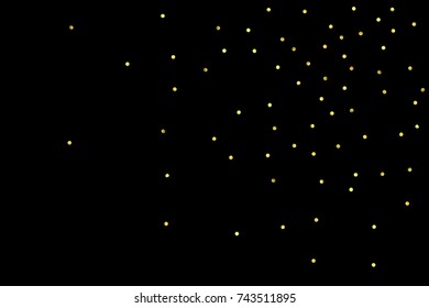 Glitter gold particles on black background. Vector star dust effect isolated on dark backdrop. 2018 christmas card with glowing falling tiny confetti. Luxury invitation template. Sparkling texture.