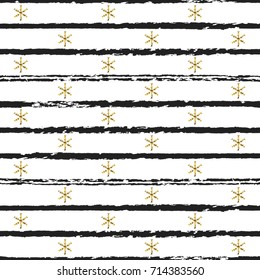 Glitter gold striped Christmas New Year seamless pattern with snowflakes. Paint brush strokes background. Golden snowflakes. Stripes lines. Vector illustration. Hipster trendy wrapping gift paper