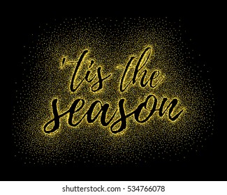 Glitter gold textured calligraphic inscription Tis the season of golden sprinkled confetti. Lettering design element for banner, greeting card, invitation, postcard, flyers. Vector illustration