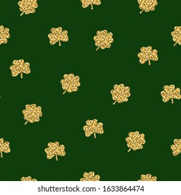 Glitter seamless plants pattern. Golden clover with 3 and 4 leaves on a green background. Symbol of good luck, success, money, St. Patrick's Day. Vector illustration for a traditional Irish holiday