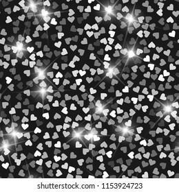 Glitter seamless texture. Actual silver particles. Endless pattern made of sparkling hearts. Unique abstract vector illustration.