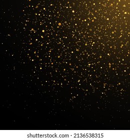 Glitter texture on a black background. Sparkling magical dust particles. Christmas concept.