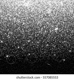Glittering background with glowing lights. Particles abstract on a dark backdrop.