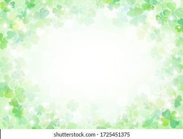 Glittering background of green clover