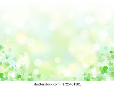 Glittering background of green clover