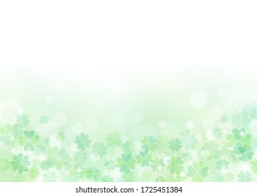Glittering background of green clover