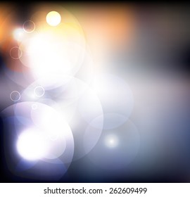 Glittering circles on black background